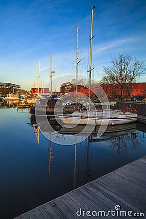 Vertical shot of a yachts port in Klaipeda, Old Town, Lithuania in the morning Editorial Stock Photo