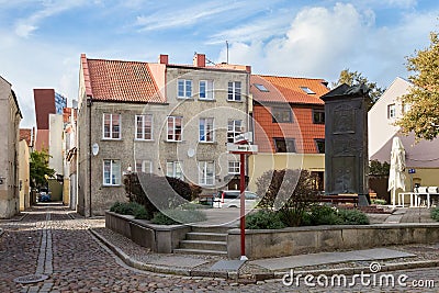 KLAIPEDA, LITHUANIA - SEPTEMBER 22, 2018: Square with bronze sculpture known as Tower in the historical part of Klaipeda Memel. Editorial Stock Photo