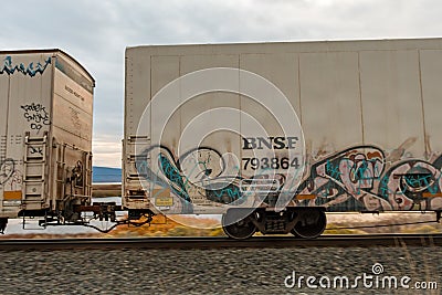 One of the wagons of a freight train passing through Klamath Falls Editorial Stock Photo