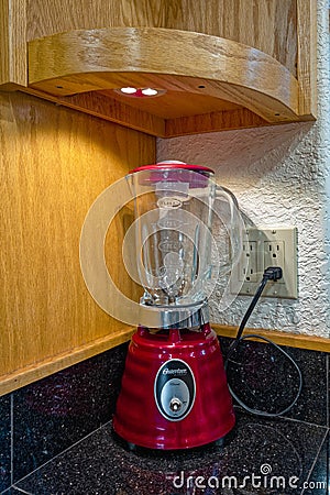 Klamath Falls, Oregon, USA - October 26, 2023: A red Osterizer 4126 Contemporary Classic Beehive Blender on a kitchen countertop Editorial Stock Photo
