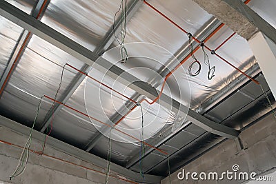 Electrical services, conduit and wiring above the ceiling. Editorial Stock Photo