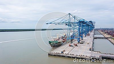 Klang, Malaysia - October 09, 2022: Cranes at the port Klang near Kuala Lumpur. Container crane at Klang Harbor. Aerial view on a Editorial Stock Photo