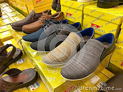 Klang, Malaysia: 25th August 2022- Casual men shoes displayed for sale at the shopping mall Editorial Stock Photo