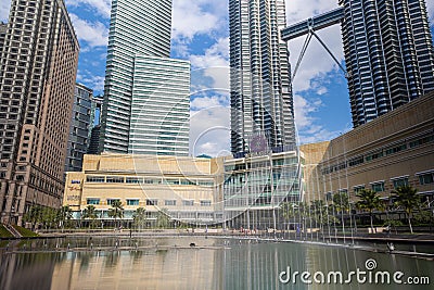 The KLCC Park with the water fountain show in front of the Petronas towers. Editorial Stock Photo