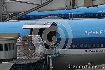 KLM cargo aircraft gets loaded with urgent freight at Amsterdam Editorial Stock Photo