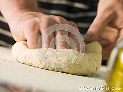 Kneading Pizza Dough Stock Photo