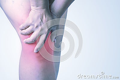 Knee injury in humans .knee pain,joint pains people medical, mono tone highlight at knee Stock Photo