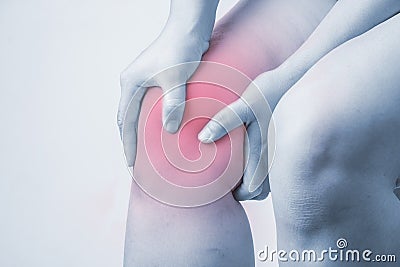 Knee injury in humans .knee pain,joint pains people medical, mono tone highlight at knee Stock Photo