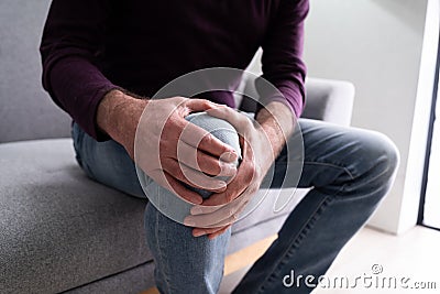 Knee Joint Pain After Injury. Elder Stock Photo