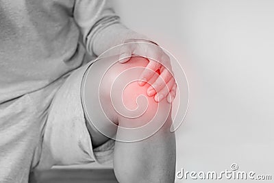 Knee joint pain, a man suffering from knee pain , on white background Stock Photo
