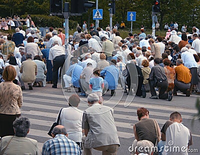 Kneeling crowd Editorial Stock Photo