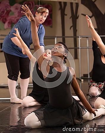 Kneeling Dance Students Stock Photo