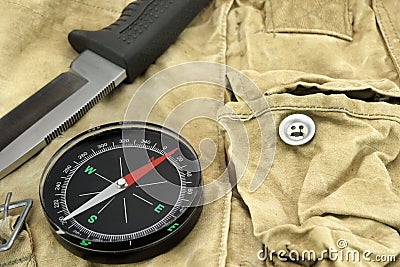 Knife and Compass on the Camouflage Bag Stock Photo