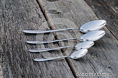 Knife and fork on wooden background. Cutlery on wooden Stock Photo
