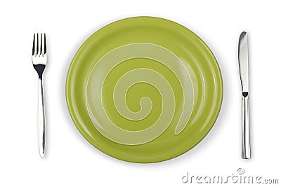 Knife, green plate and fork isolated top view Stock Photo