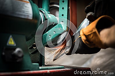 Knife grinding Stock Photo