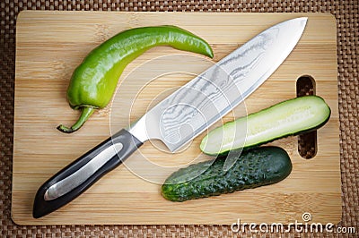 Knife kitchen with a blade from Damask steel Stock Photo