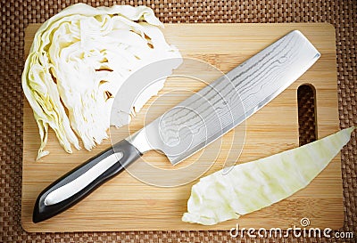 Knife kitchen with a blade from Damask steel Stock Photo