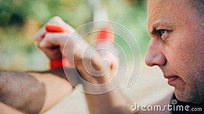 Knife vs knife. Kapap instructor demonstrates fighting and disarming technique Stock Photo