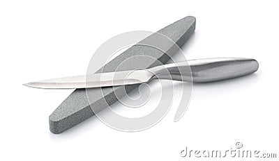 Knife and whetstone Stock Photo