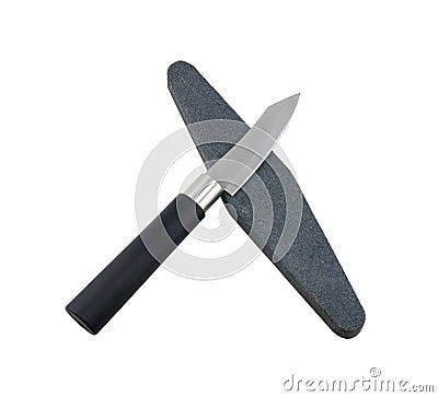 Knife and whetstone Stock Photo