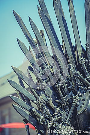 Knight, royal throne made of iron swords, seat of the king, symbol of power and reign Stock Photo