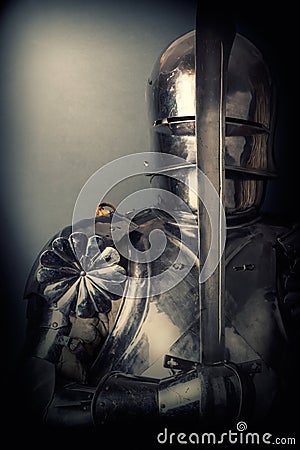 Knight wearing armor Stock Photo