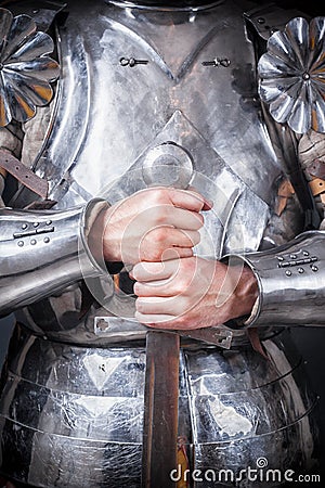 Knight wearing armor Stock Photo