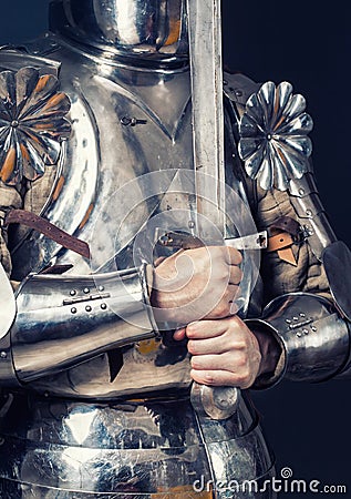 Knight wearing armor Stock Photo