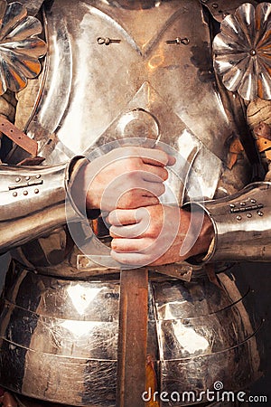 Knight wearing armor Stock Photo