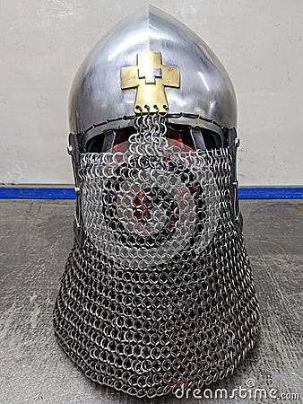 Knight's metal helmet with aventail chain mail. Stock Photo