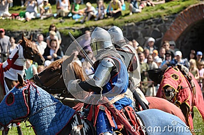 Knights fighting on horseback Editorial Stock Photo