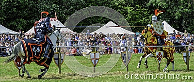 Knights joust in front of an excited crowd Editorial Stock Photo