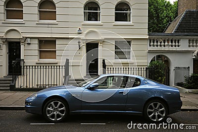 Knightsbridge residential and retail district in central Londonand a luxury Maserati car as a wealthy status symbol Editorial Stock Photo