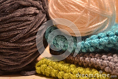 Knits and balls of knitting threads. Stock Photo
