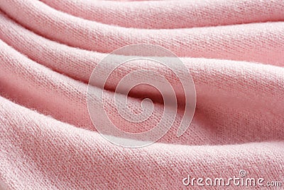 Knitted cashmere pink fabric texture with large fold Stock Photo