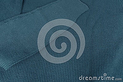 Knitted jersey, embossed canvas, blue wool yarn, knitted texture, concept of warm things for cold weather, check quality, Stock Photo