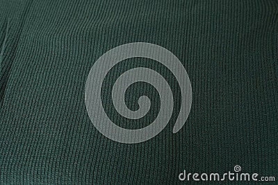 knitted jersey, embossed canvas, green wool yarn, knitted texture, concept of warm things for cold weather, check quality, Stock Photo