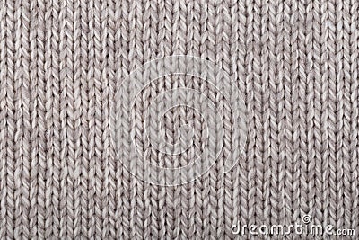 Knitted natural brown wool texture as background.Close up.Concept for knitting cozy sweaters, warm winter knitted clothes, Stock Photo