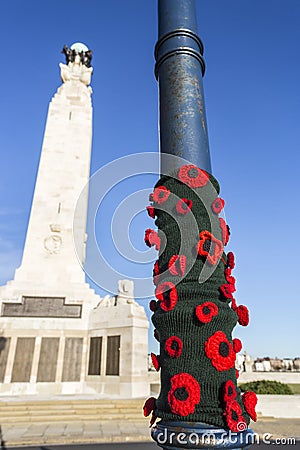 Knitted poppies at the Portsmouth Naval Memorial Extension Editorial Stock Photo