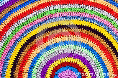 Knitted round carpet or rug Stock Photo