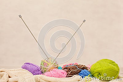 Knitting needles, colorful threads. colorful yarn wool, Knitting background, a lot of balls, selective focus Stock Photo
