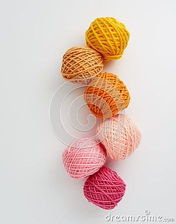 Knitting yarn balls in pink and yellow tone. Stock Photo