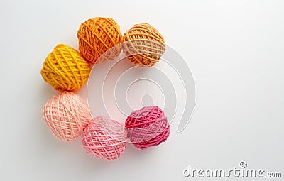 Knitting yarn balls in pink and yellow tone. Stock Photo