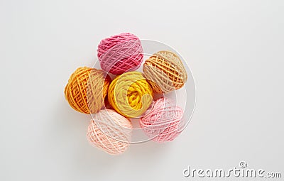 Knitting yarn balls in pink and yellow tone. Stock Photo