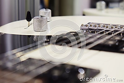 Knobs on a electric guitar, part of an electric guitar Stock Photo