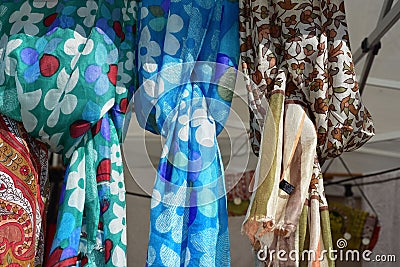 Display of colored silk scarves Stock Photo