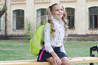 Knowledge is light. Happy child on September 1. Knowledge day. Little girl carry school backpack. Education and study Stock Photo