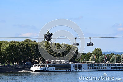 Koblenz, Germany - 09 12 2022: Seilbahn Koblenz and a ship below Kaiser Wilhem statue Editorial Stock Photo