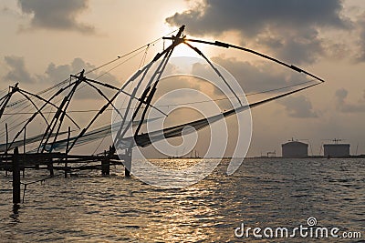 Chinese fishnets on sunset. Kochi, Kerala, India Stock Photo